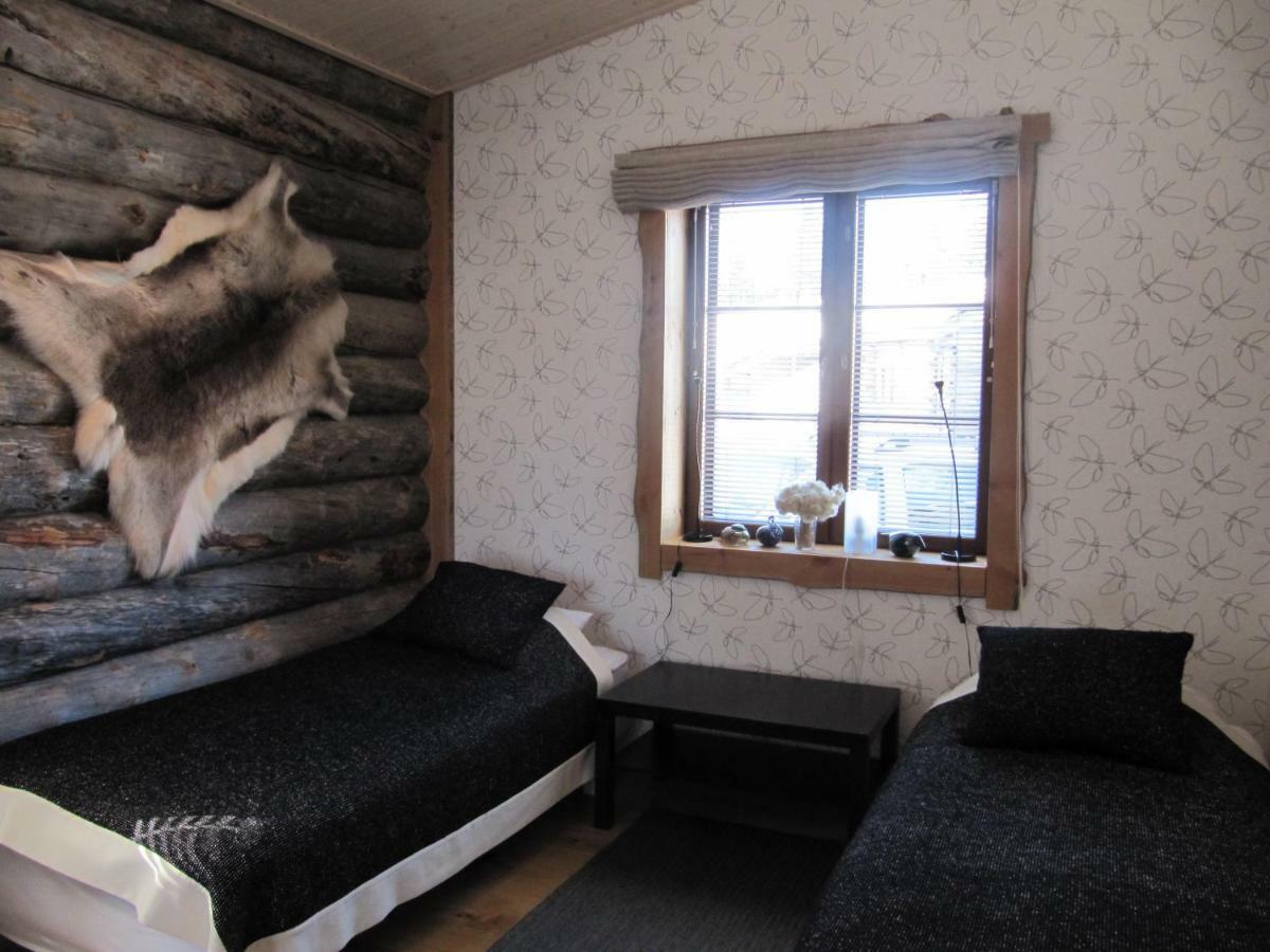 Lapin Kutsu Log Cabins Saariselka Esterno foto